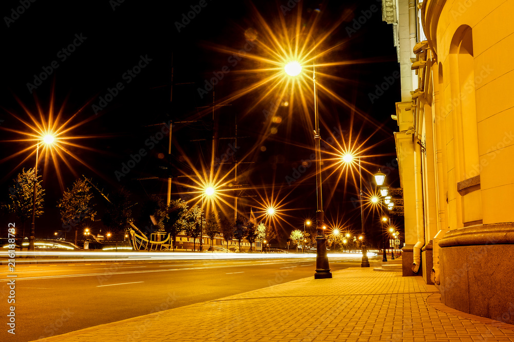 Night city street lights, bokeh, background, darkness. The light from the  lanterns. Light loop from the headlights. Stock Photo | Adobe Stock