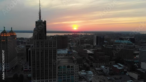 Aerial shot flying away from buildings in downtown Buffalo NY at dusk photo