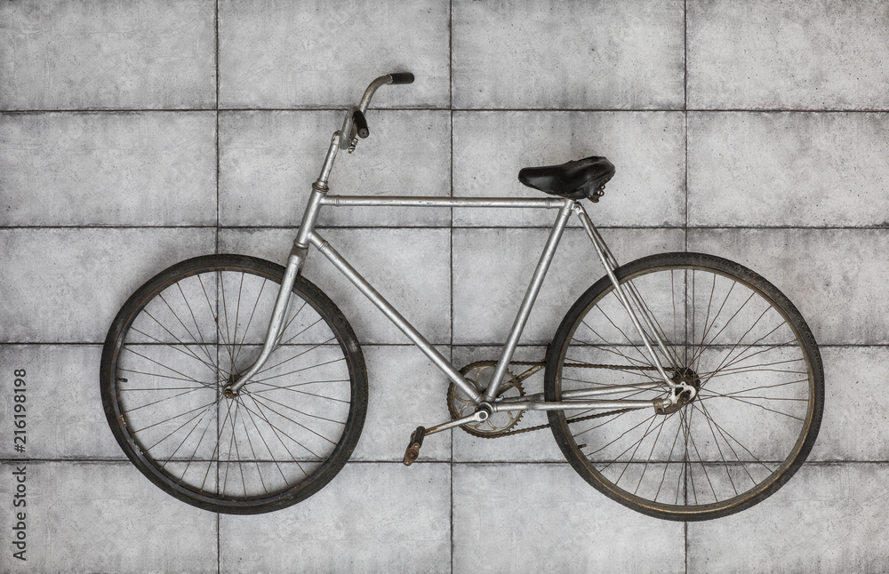 old vintage bicycle on the concrete floor