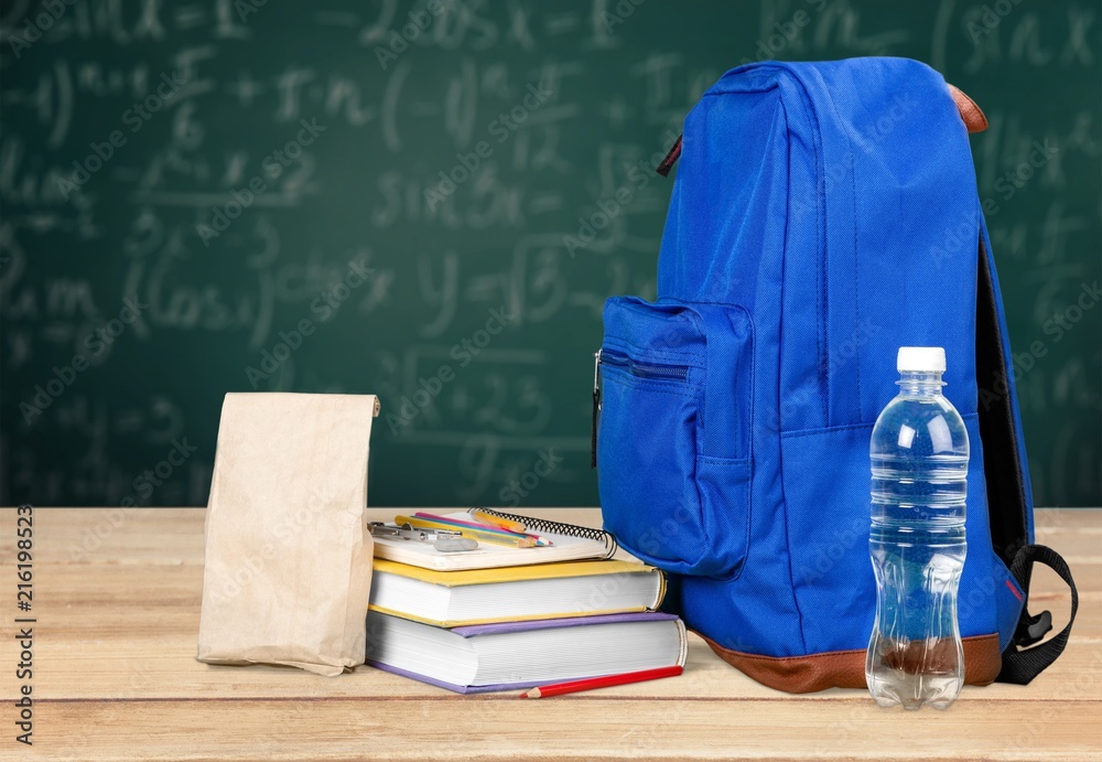 Blue School Backpack on desk Blue School Backpack on desk