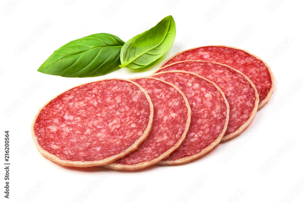 Salami with basil leaf. Smoked sausage thinly sliced, isolated on white background. Salami with basil leaf. Smoked sausage thinly sliced, isolated on white background.