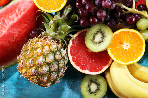 Fototapeta Naklejka Na Ścianę i Meble -  Fresh organic fruits background. Healthy eating concept.