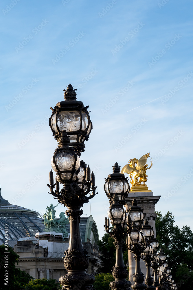 Close-up of Art Nouveau lamps on Pont Alexandre III bridge - Paris, France