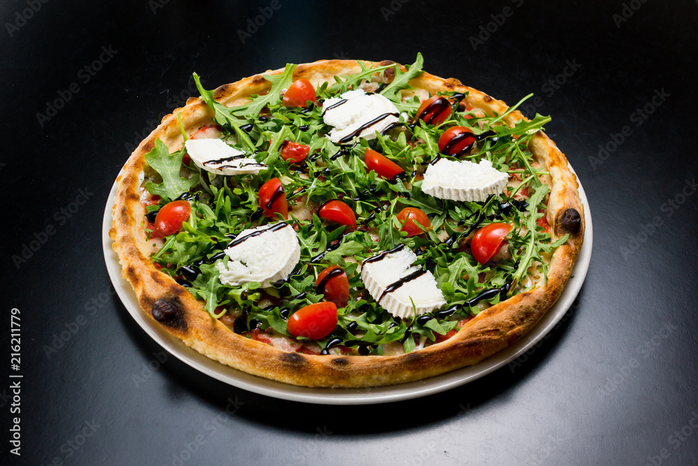 Top view of a delicious and prococative pizza Top view of a delicious and prococative pizza