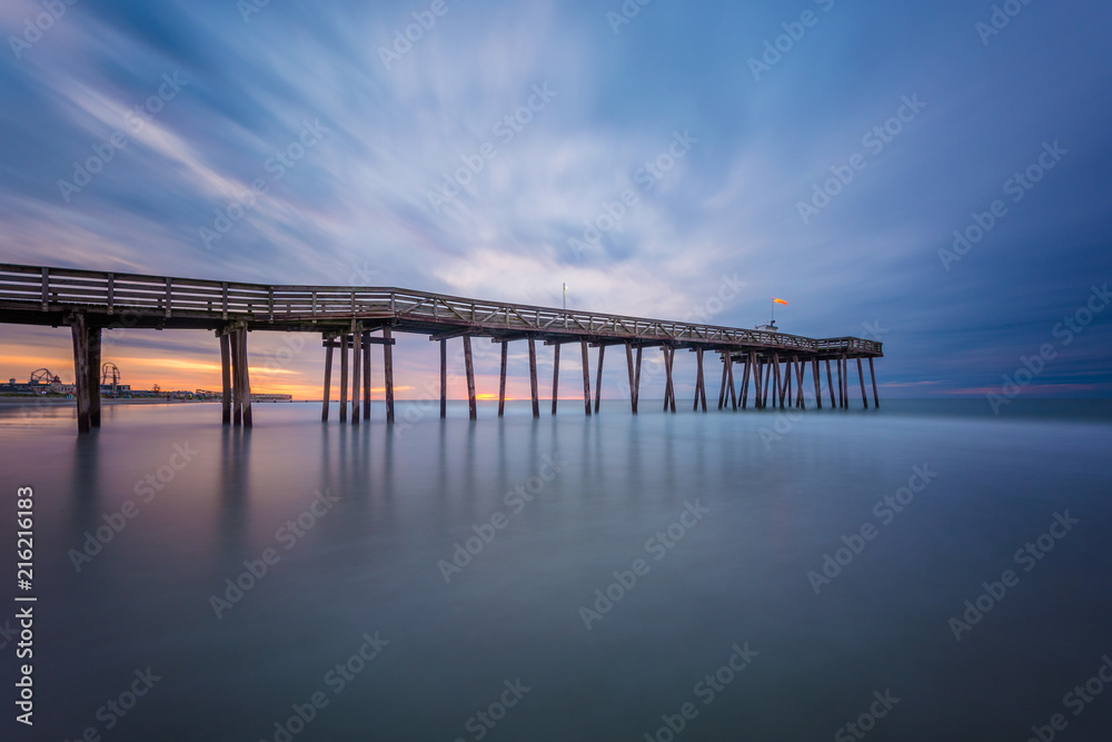 A pier at sunrise in Ocean City, New Jersey.