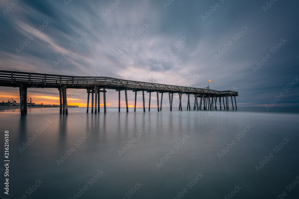 A pier at sunrise in Ocean City, New Jersey.