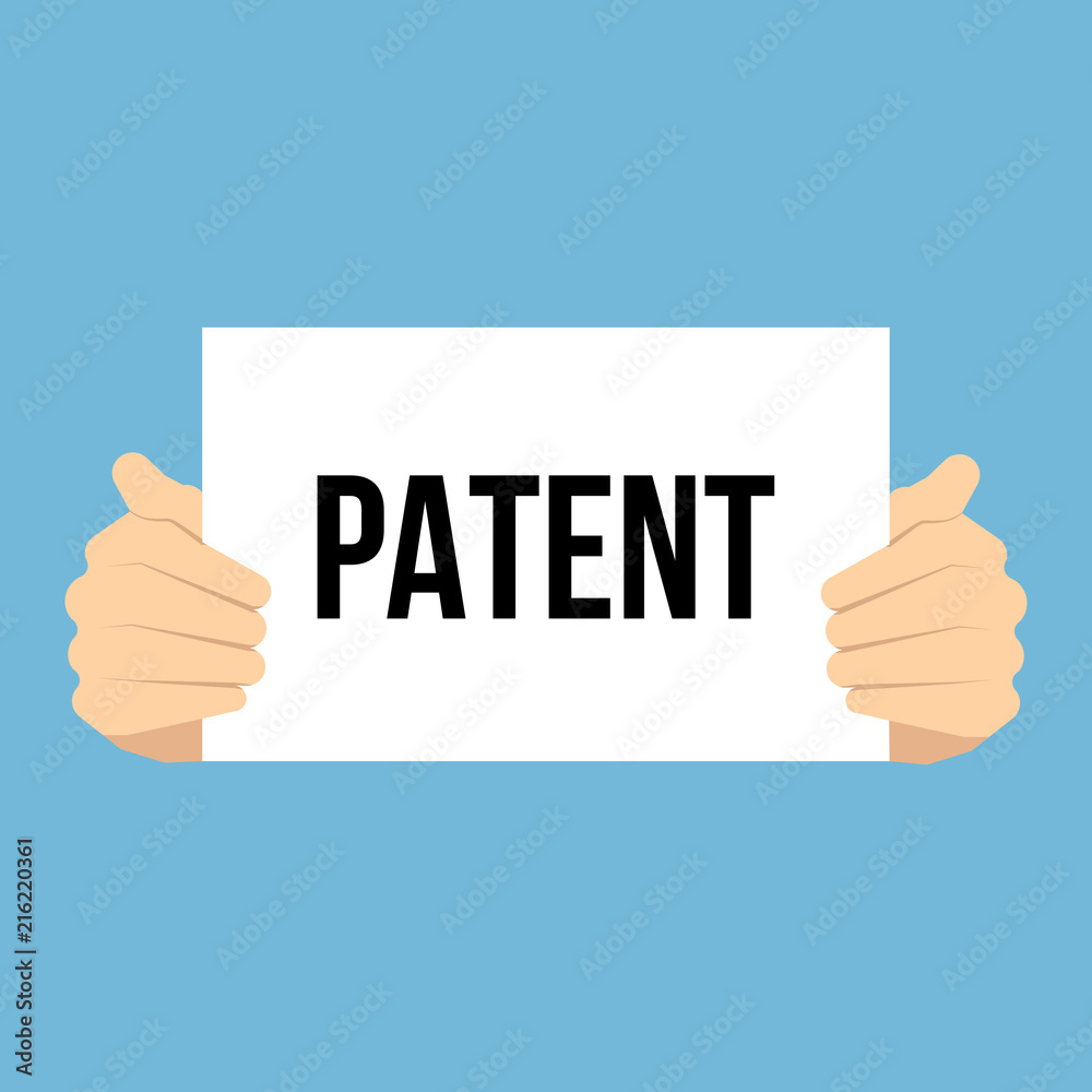 Man showing paper PATENT text Man showing paper PATENT text