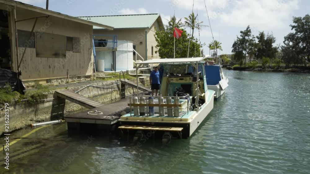A beautiful shot of a boat docked on a pier. A beautiful shot of a boat docked on a pier.