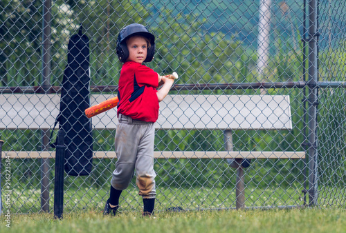  Young Kid Playing Baseball