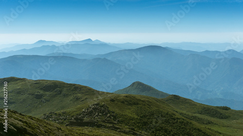 Distant and beautiful mountainous area of unspoilt nature and beautiful blue sky