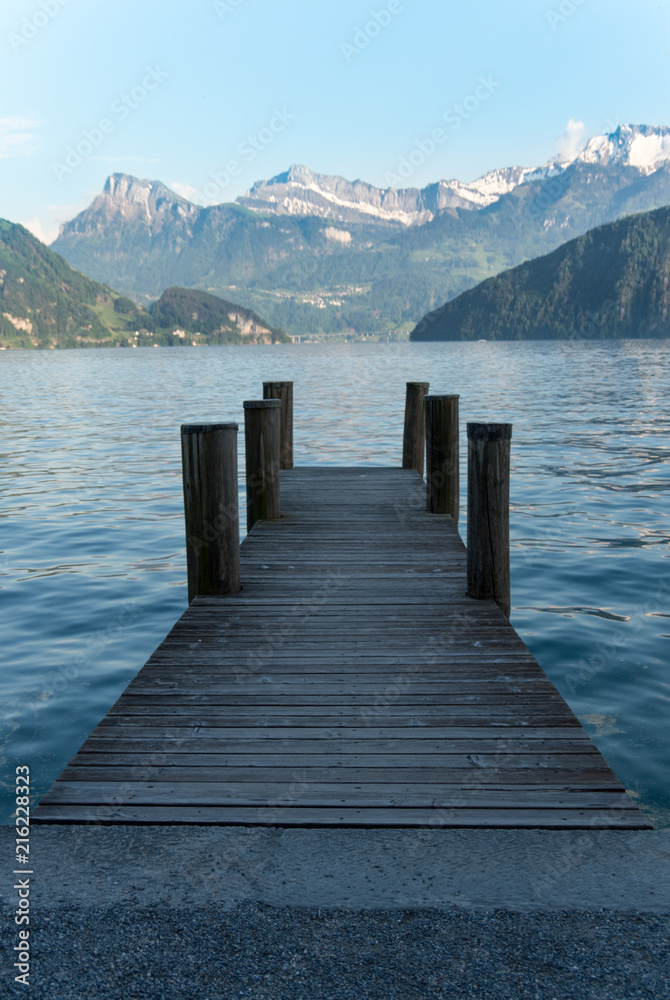 Pier in a lake in the Swiss Alps Pier in a lake in the Swiss Alps