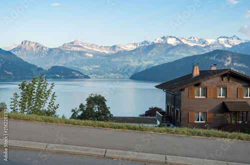 Lake lucerne as seen from weggis on a lakeside road