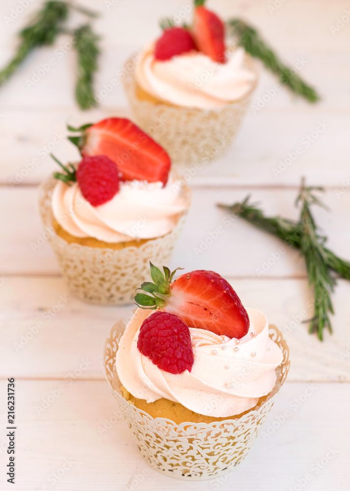 Cupcakes with strawberries and raspberries. Cake for wedding, birthday. Cupcakes with strawberries and raspberries. Cake for wedding, birthday.
