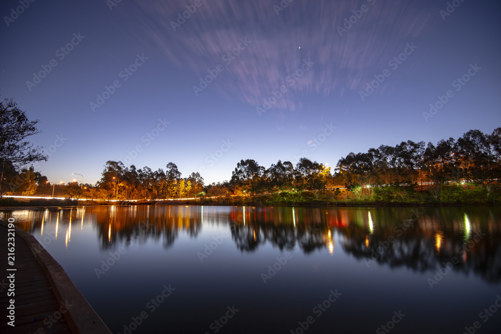 Fototapeta premium Beautiful lake in Springfield Lakes at dusk.