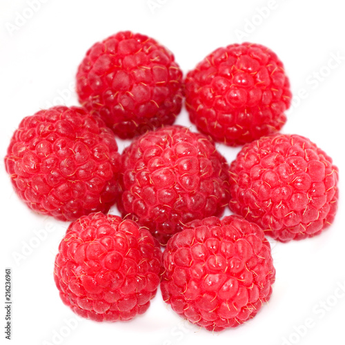 Isolated Fresh Raspberries arrangement on a white background