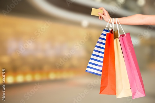 Woman hand with many shopping