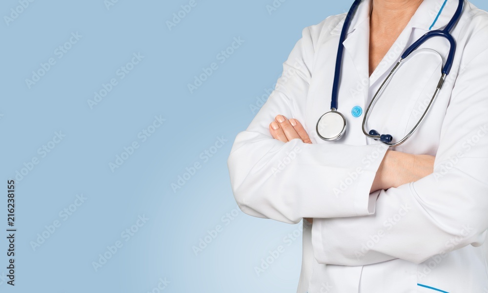 Young man doctor holding stethoscope