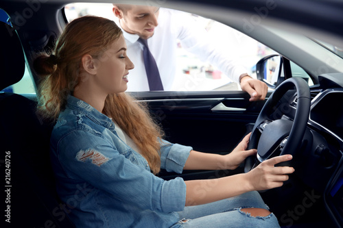 Woman sitting on driver's s...