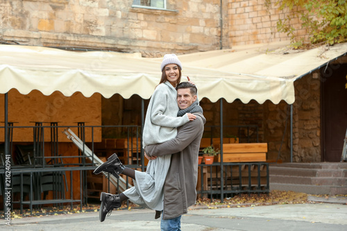 Beautiful couple in warm cl...