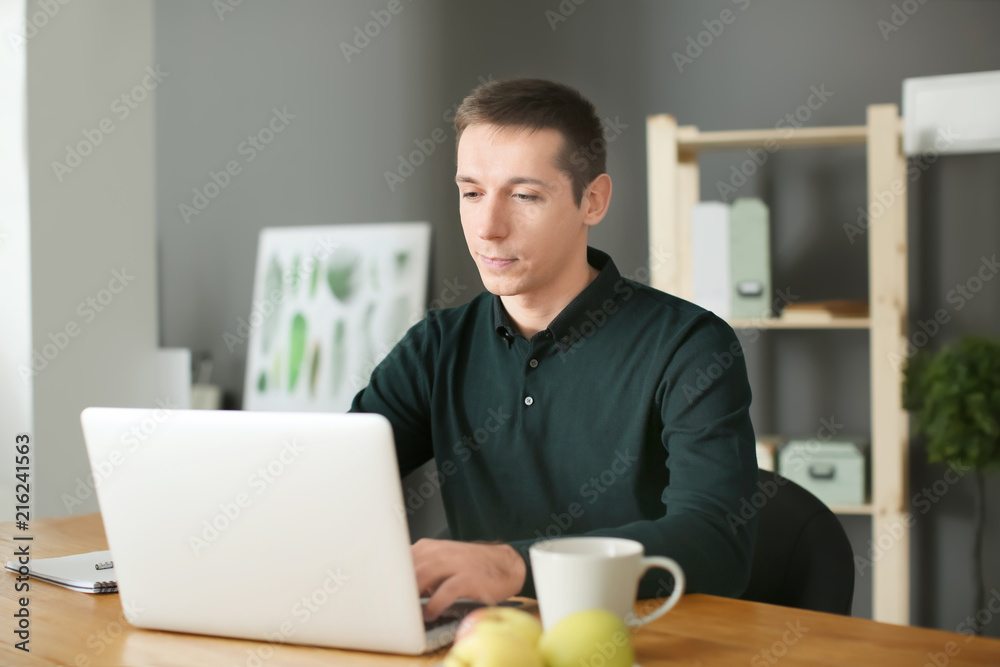 Portrait of young man in casual clothes indoors Portrait of young man in casual clothes indoors