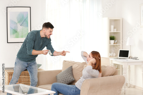Angry man scolding his wife...