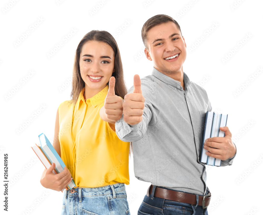 Happy students with books on white background. Exam result