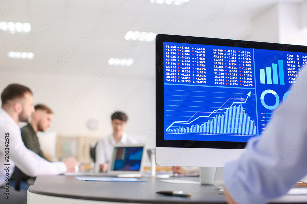 Man working with stock data in office. Finance trading