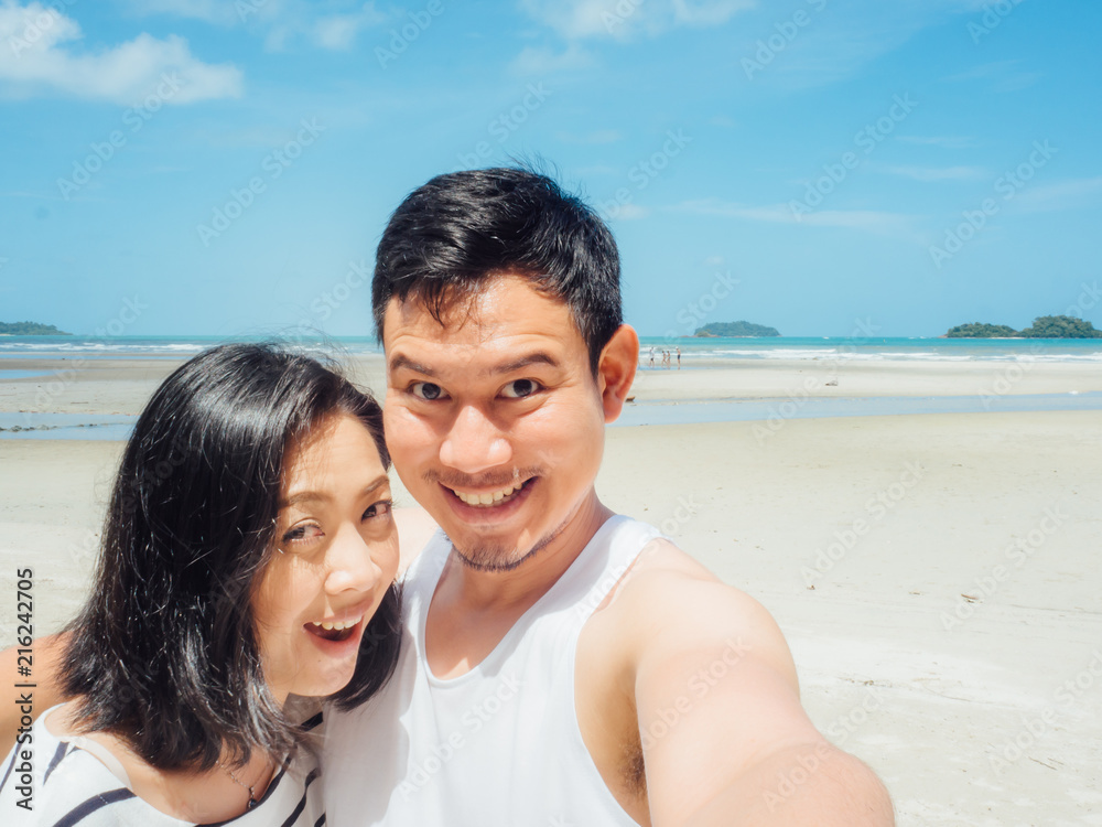 Couple tourist selfie on sunny summer beach. Couple tourist selfie on sunny summer beach.