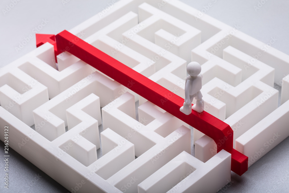 Human Figure Crossing Maze Over Red Arrow Human Figure Crossing Maze Over Red Arrow