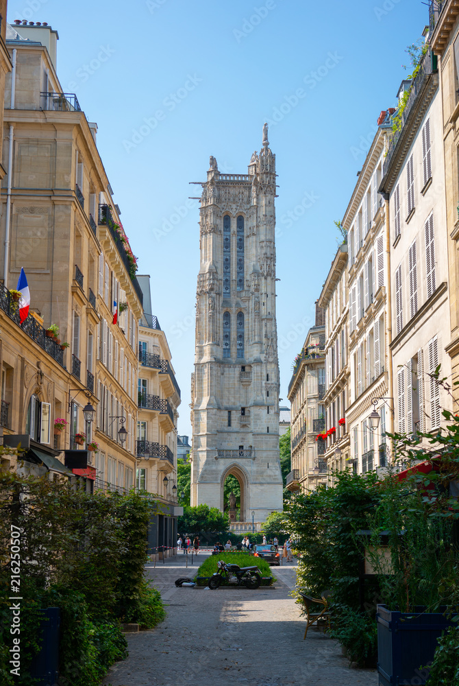 Paris typical street and Saint-Jacques flamboyant gothic tower