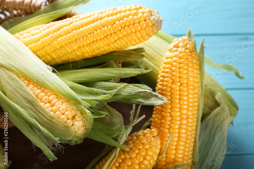 Fresh corncobs on table, closeup