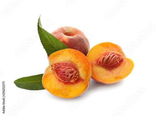 Fresh peaches on white background