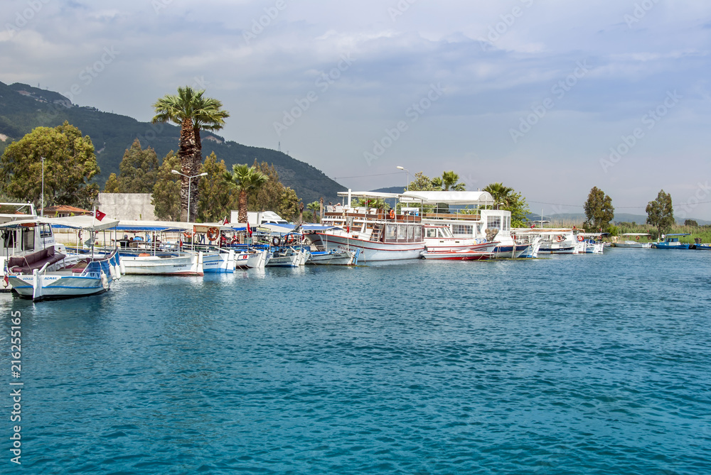 Obraz premium Mugla, Turkey, 14 May 2012: Boats at Azmak Stream, Gokova Bay, Akyaka