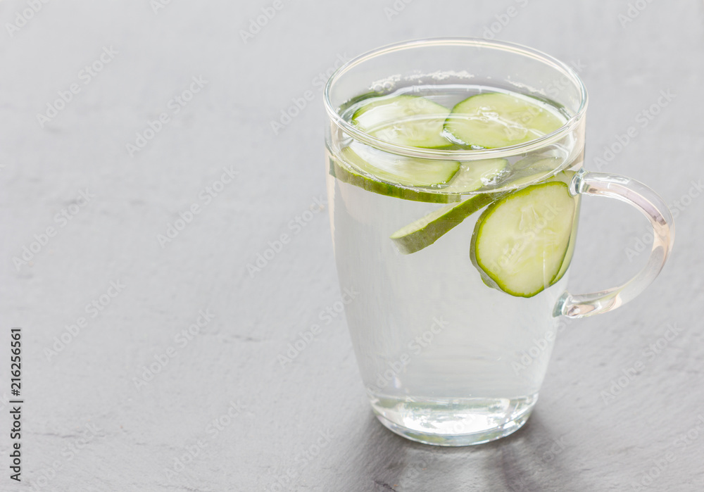 glass of water with pieces of cucumber
glass of water with pieces of cucumber