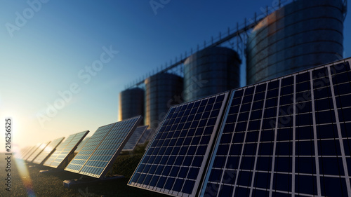 Solar Panels and Silos During the Sunrise