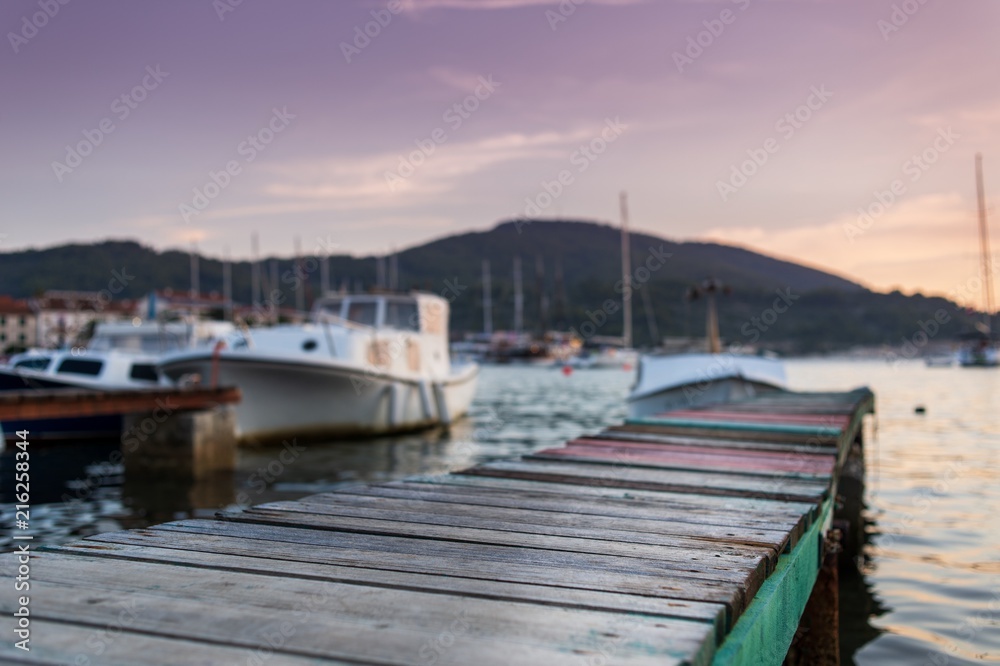 Colorful wooden pier in mediterranean village Colorful wooden pier in mediterranean village