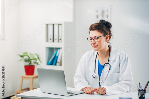 Woman Doctor at her Medical Office