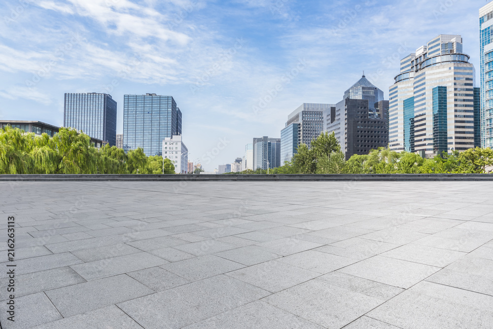 Panoramic skyline and modern business office buildings with empty road,empty concrete square floor