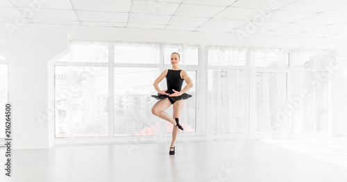 Young ballerina practising ballet moves