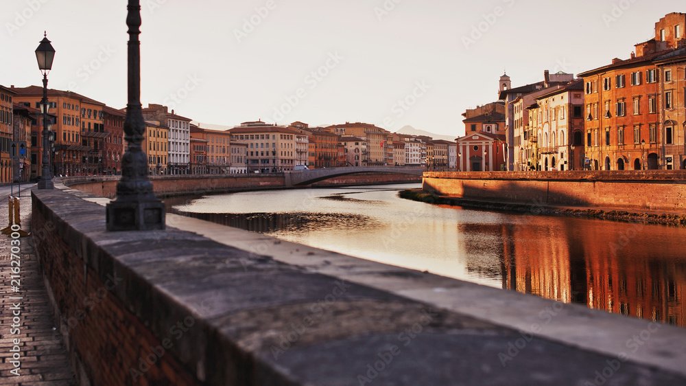 Pisa, Italy - Historical buildings along the river Arno in Pisa, Italy
