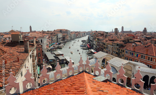venice roofs with the Rialto bridge and the ships on the Grand C