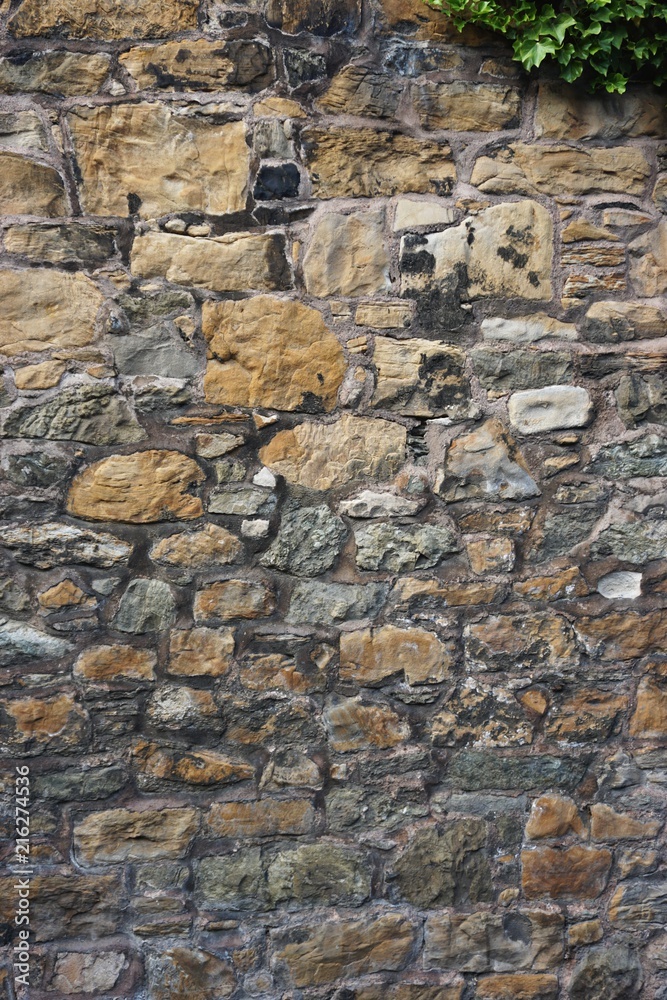 Ancient stone wall vertical abstract background Ancient stone wall vertical abstract background