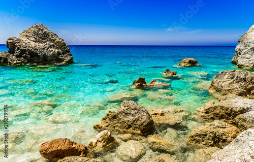 Petra beach and blue water in Lefkada island, Greece © cristianbalate
