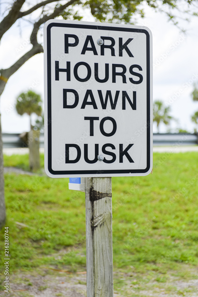 Park hours sign