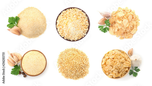 Set with dried aromatic garlic on white background, top view