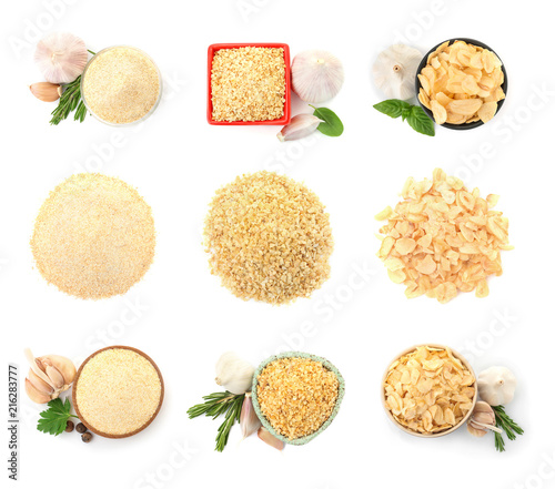 Set with dried aromatic garlic on white background, top view