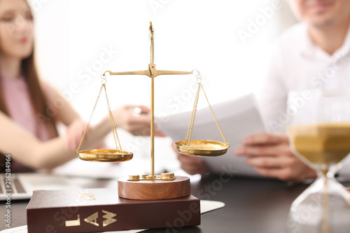 Scales of justice with juri...