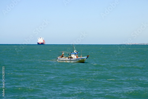 Fishing boat off the coast of the sea town of Cadiz.