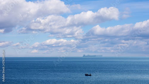 Sea, clouds and ships