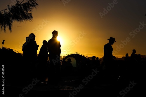 people on de sunst in australia, australianday in sunset  photo